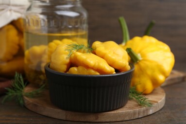 Pickled,Pattypan,Squashes,And,Dill,On,Wooden,Table,,Closeup