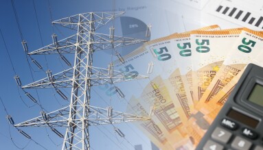 Electricity,Pylon,With,Calculator,And,Euro,Bills,Symbolizing,Rising,Energy