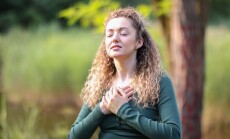 Relaxation,And,Harmony.,Happy,Woman,Meditating,In,Park