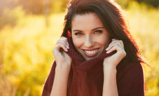 Portrait,Of,Beautiful,Brunette,Woman,In,Autumn,Red,Sweater.,Welcome