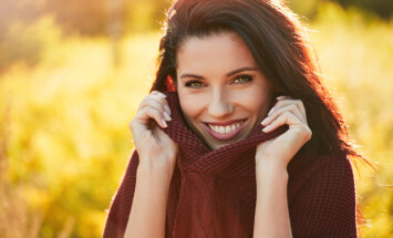 Portrait,Of,Beautiful,Brunette,Woman,In,Autumn,Red,Sweater.,Welcome