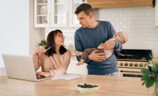 Young,Woman,Freelancer,Using,Laptop,,Working,From,Home,During,Maternity