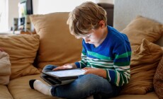 School,Boy,With,Tablet,Computer.,Schoolchild,Study,Online.,Electronic,Device