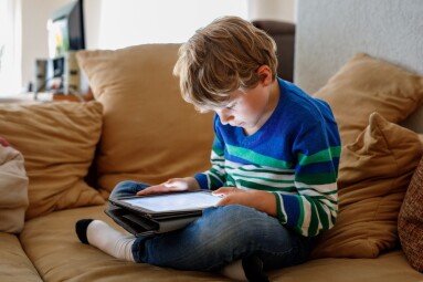 School,Boy,With,Tablet,Computer.,Schoolchild,Study,Online.,Electronic,Device