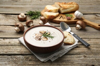 Fresh,Homemade,Mushroom,Soup,Served,On,Wooden,Table