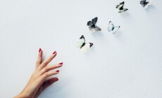 Art,,Mockup,And,Hand,Of,Woman,With,Butterfly,In,Studio