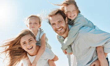 Piggyback,,Portrait,And,Family,On,Holiday,,Sky,And,Travel,For