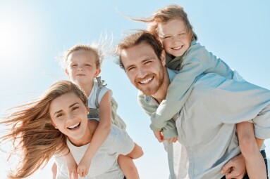 Piggyback,,Portrait,And,Family,On,Holiday,,Sky,And,Travel,For