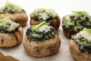 Tasty,Stuffed,Mushrooms,Served,On,White,Wooden,Table,,Closeup
