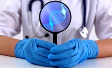 Scientist,Holding,Magnifying,Glass,With,Dna,Spiral,Inside,At,Table,