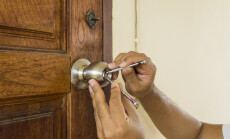 Locksmith,Use,Screwdriver,Open,Wood,Door,In,Emergency,Time,