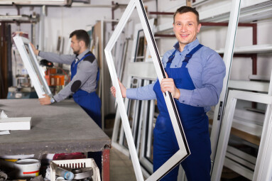 Smiling,Production,Workers,In,Coverall,With,Different,Pvc,Windows,And