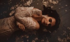 Mysterious,Caucasian,Woman,In,White,Lace,Dress,Lying,On,A
