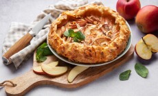 Freshly,Baked,Apple,Galette,Decorated,With,Almond,Flakes,And,Mint,