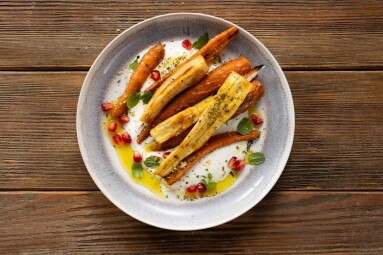 Top,View,Of,Roasted,Carrot,And,Parsnip,Yogurt,Wooden,Surface