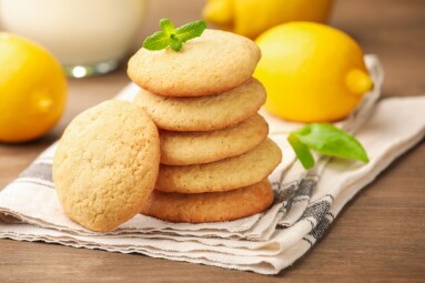 Tasty,Lemon,Cookies,,Mint,And,Fruits,On,Wooden,Table,,Closeup
