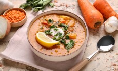 Bowl,Of,Tasty,Lentil,Soup,And,Ingredients,On,Beige,Grunge