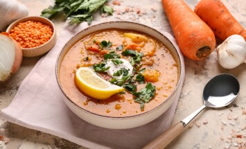 Bowl,Of,Tasty,Lentil,Soup,And,Ingredients,On,Beige,Grunge