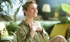 A,Serene,Woman,In,Her,40s,Holds,Her,Hands,Over